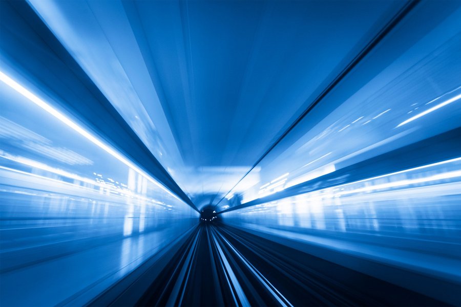 Fast transit - Abstract motion-blurred view from the front of a train  