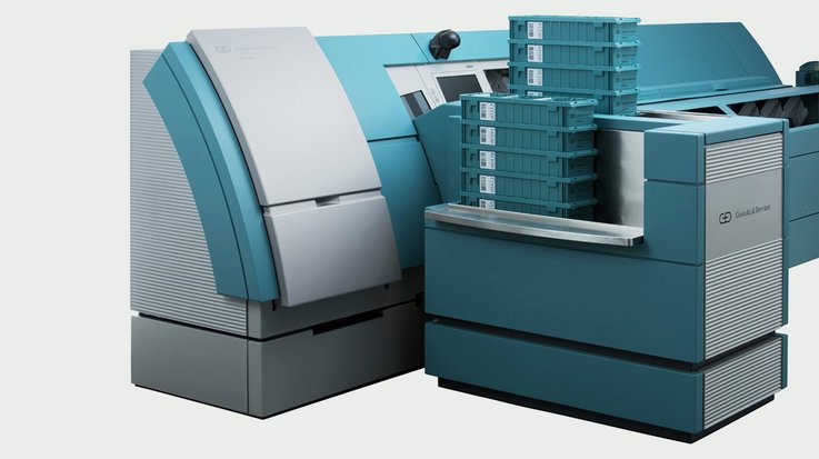 Eine große Maschine zur Banknotenbearbeitung, die maschinell alle ausgegebenen Bündel verpackt 