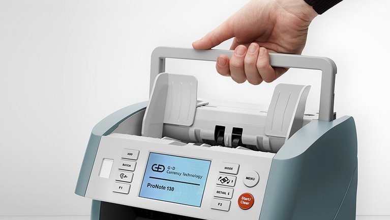 The compact ProNote® 130 banknote processing system can be easily transported using a carrying handle