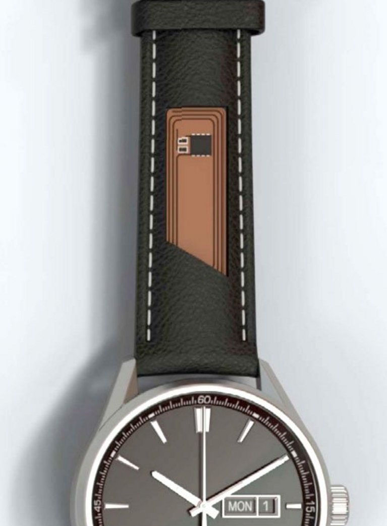 An analog wristwatch with the G+D FlexiTag on the strap