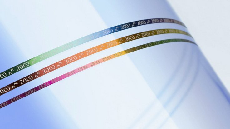 Colorful ColourShift security threads on a white paper