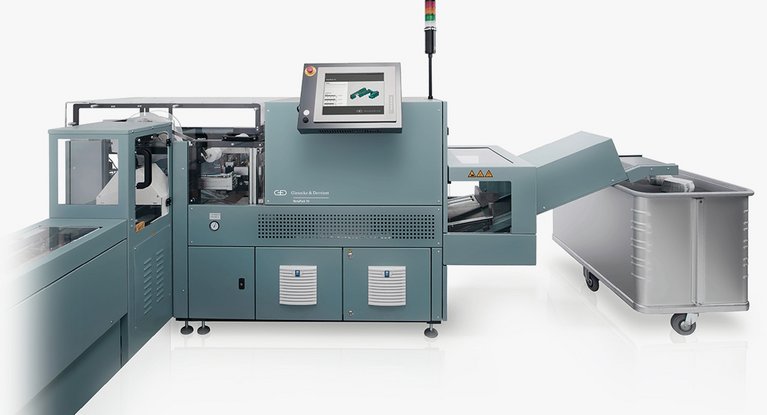 The NotaTray® loading module fills banknotes into BPS® M-systems, using a robotic gripper.