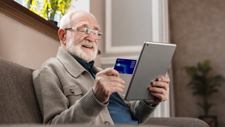 Senior citizen making an online payment