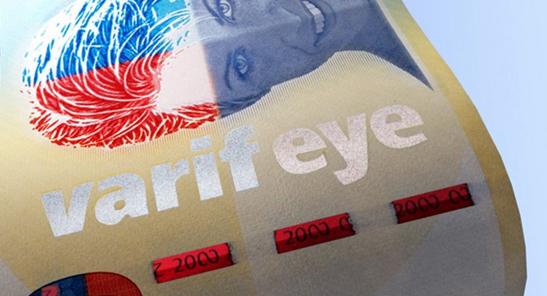 Iridescent color effects on a banknote with the inscription "varifeye".