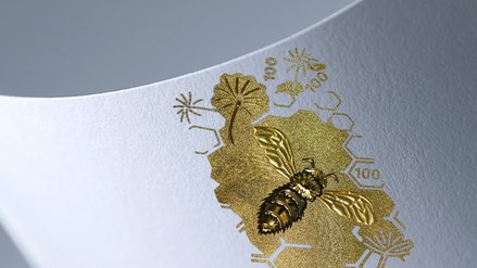Darstellung eines Sicherheitszeichens für Banknoten mit dem Motiv einer Biene und Honigwaben