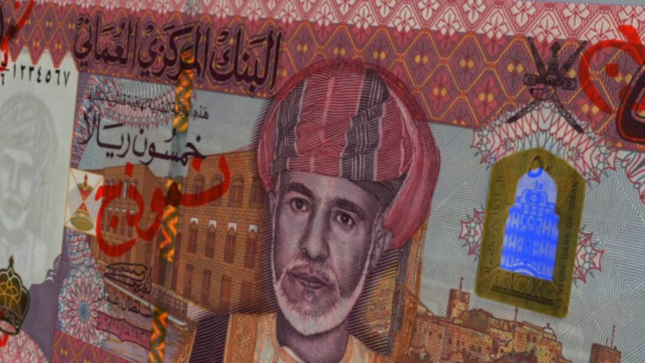 Close-up of a banknote from Oman with various security features