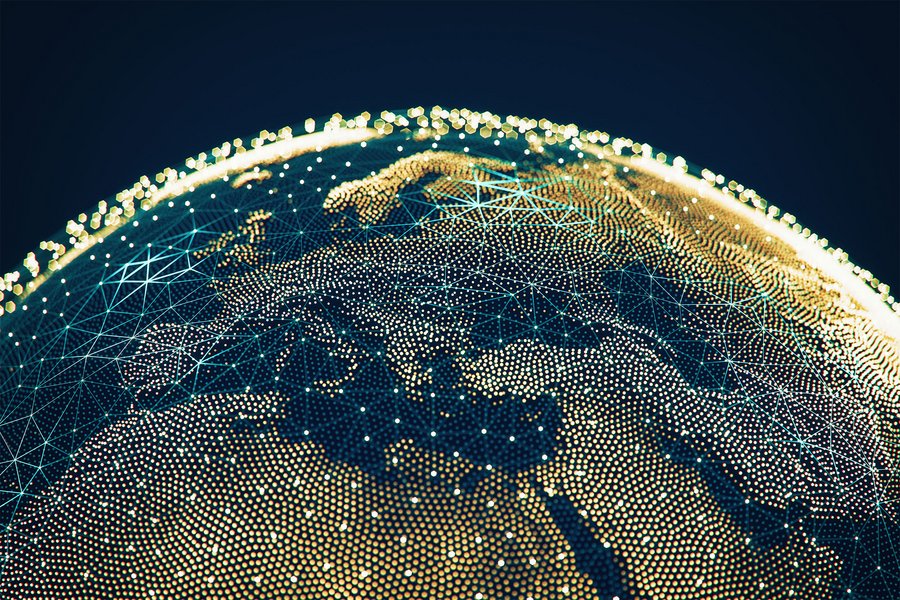 Globe with network infrastructure connecting regions, representing global expansion of fintechs