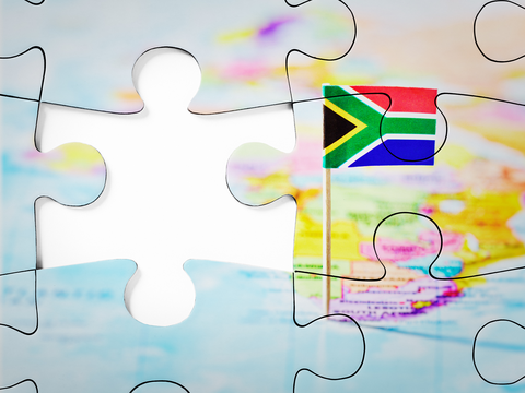 Zeigt Fehlendes Puzzleteil eines Puzzels von einer Weltkarte mit Südafrika im Fokus