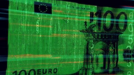 A 100€ banknote illuminated with special green light