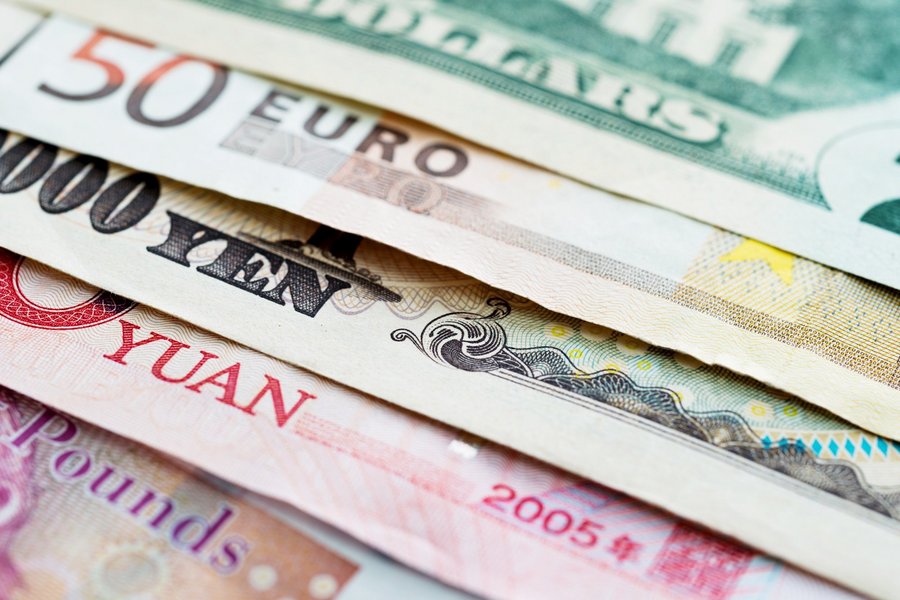 Background of several international currency notes. EURO, YEN, POUNDS, DOLLARS