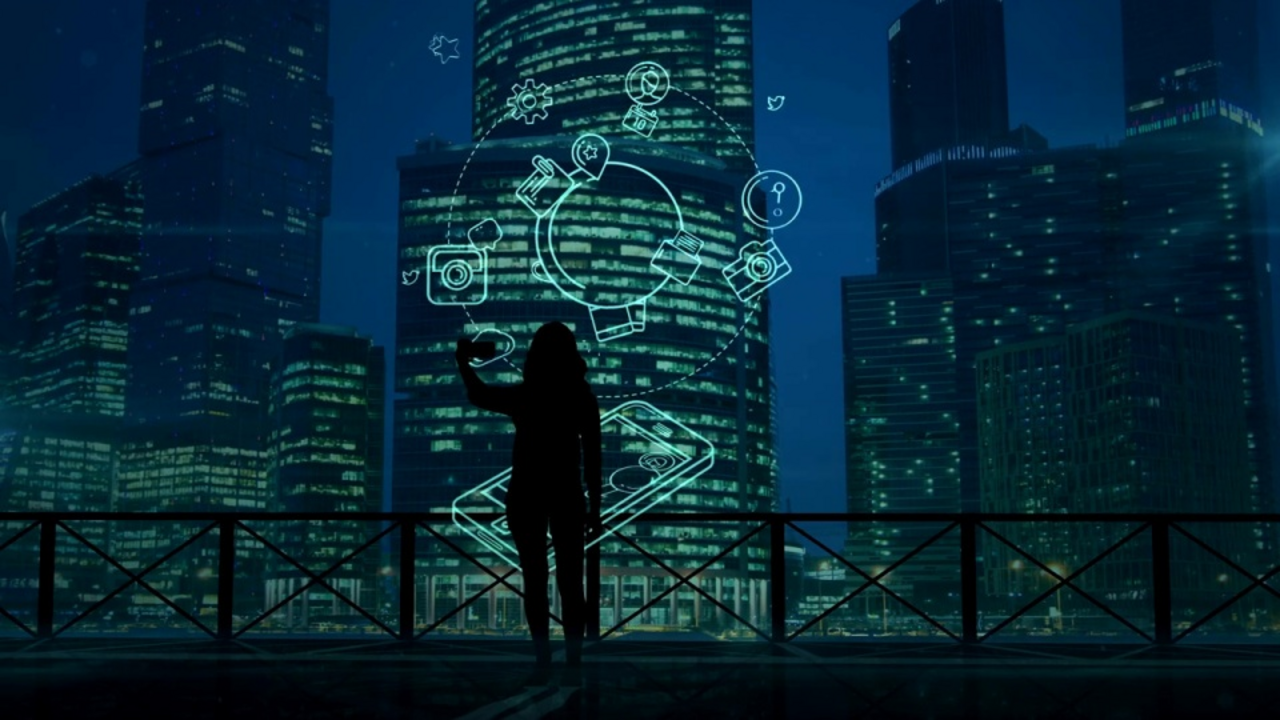 A woman holds up her smartphone, against a big city backdrop at night, various icons light up in front of her