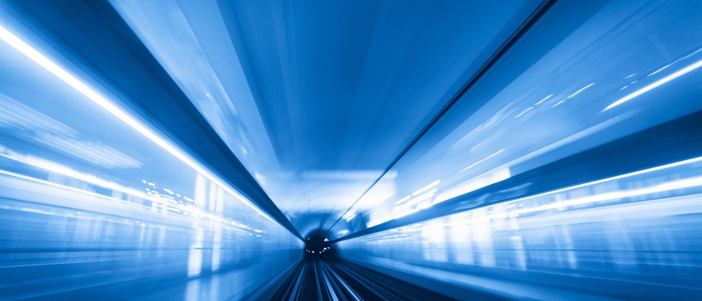 Fast transit - Abstract motion-blurred view from the front of a train  